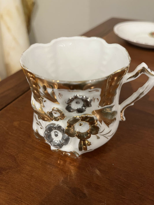 Gilded tea cup