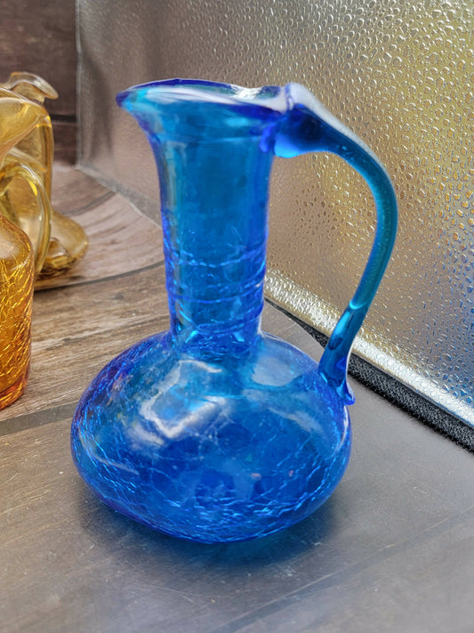 Bright blue small crackle glass pitcher