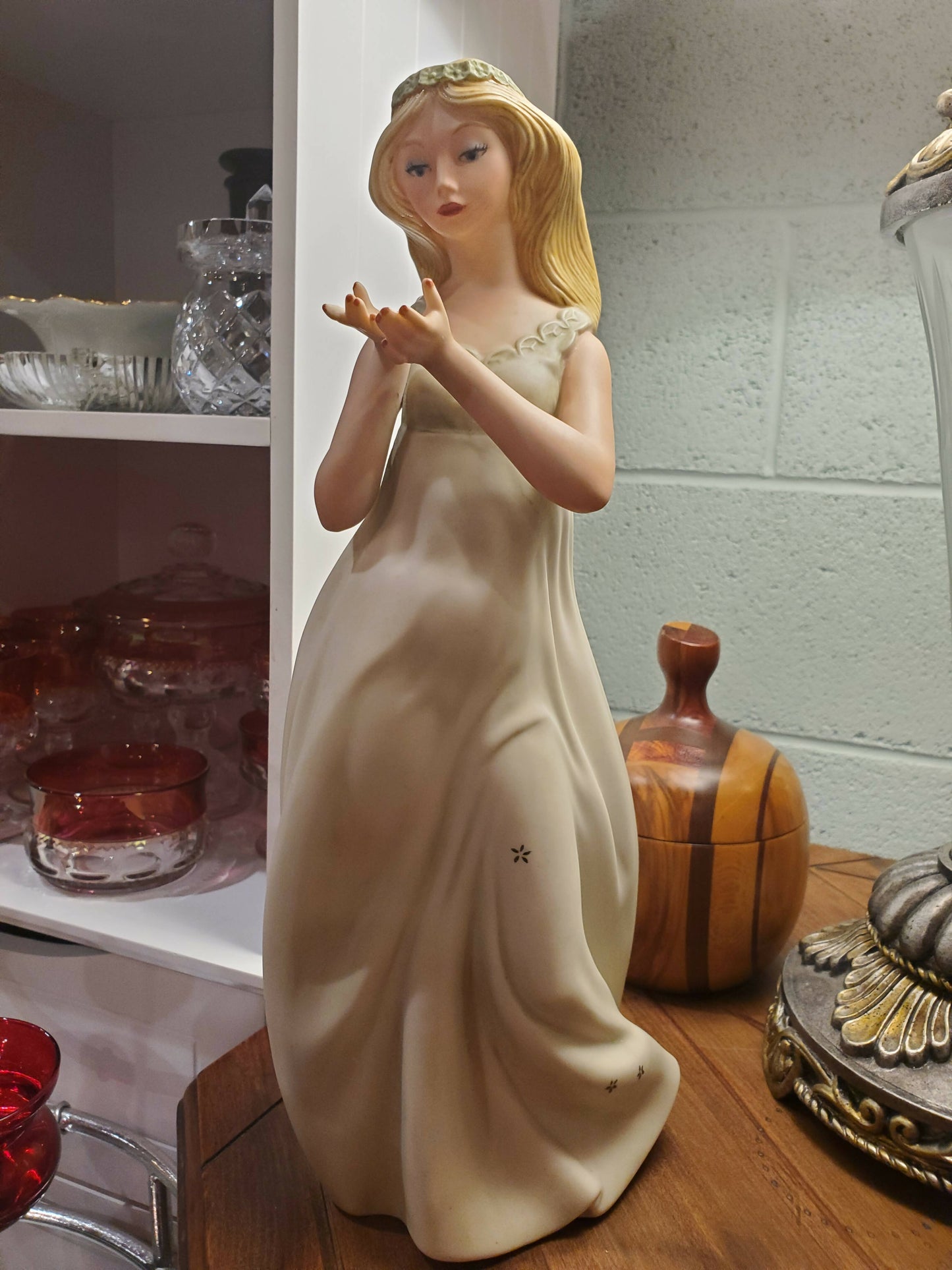 Porcelain doll figurine
