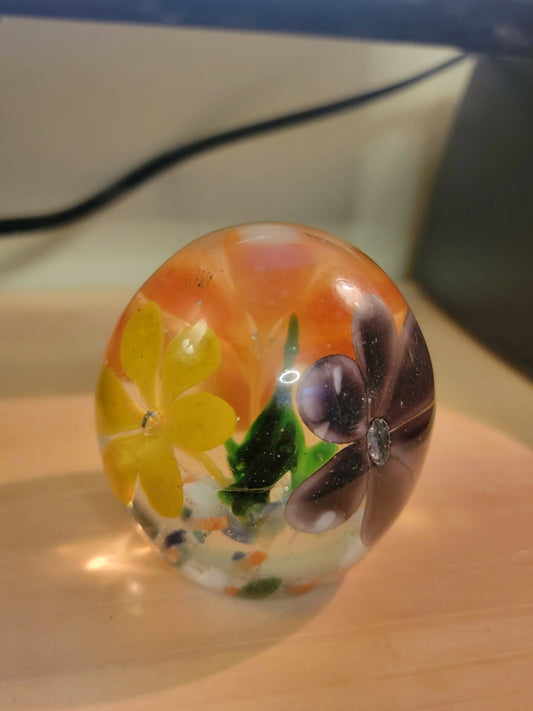 Signed paperweight with flowers