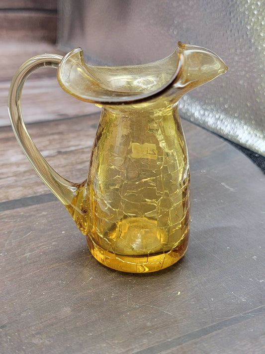 Small light brown crackle glass pitcher