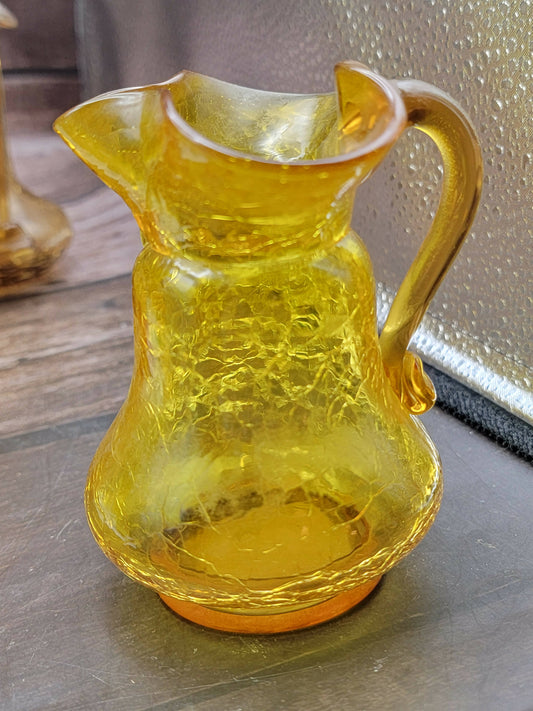 Small orange crackle glass pitcher