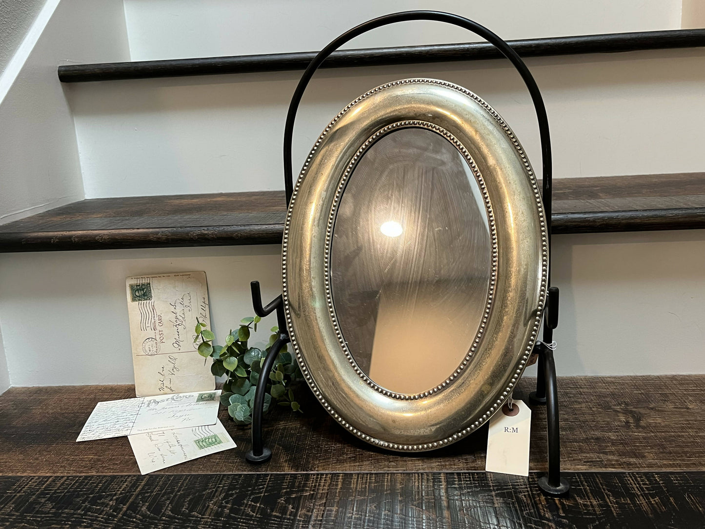 Vintage oval metal frame mirror