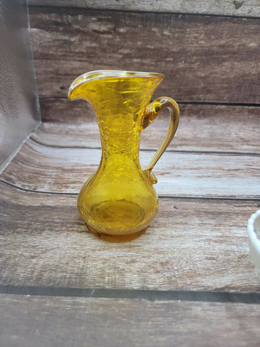 Orange crackle glass small pitcher