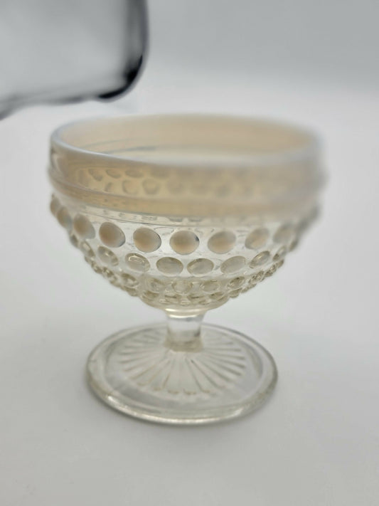 Footed moonstone hobnail cup